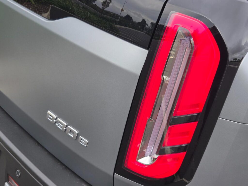 Close up of the rear LED tail lights of a silver BAIC B30 hybrid SUV
