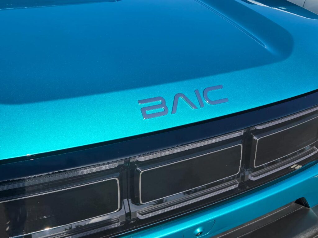 Close up of the front grille and BAIC logo on a blue BAIC B30 SUV  
