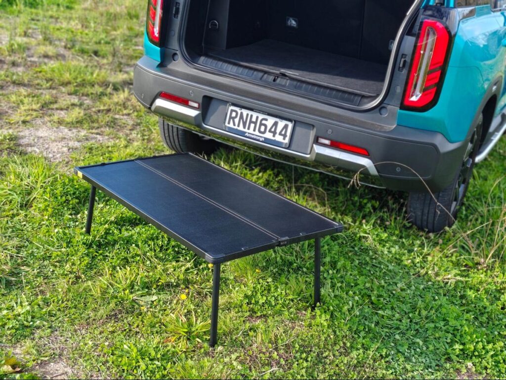 The BAIC B30 SUV's cargo cover transforms into a picnic table